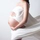 pregnant woman in sheets