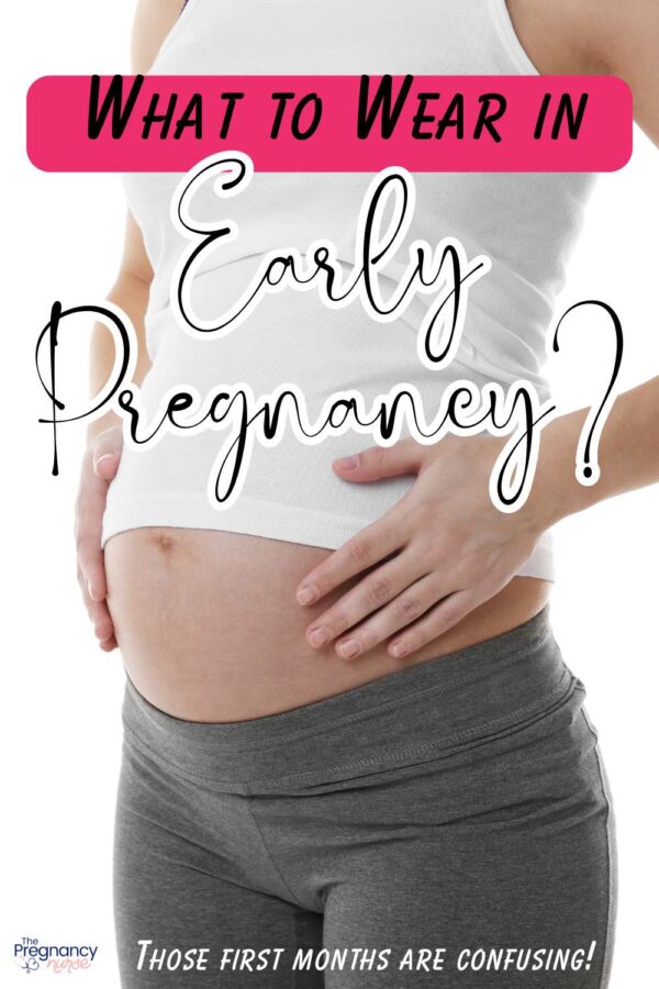 woman in early pregnancy holding belly // what to wear in early pregnancy -- those first few months are confuisng!