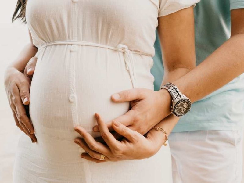 pregnant couple connecting