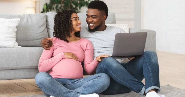 pregnant couple doing online birth classes and loving them