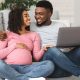 pregnant couple doing online birth classes and loving them