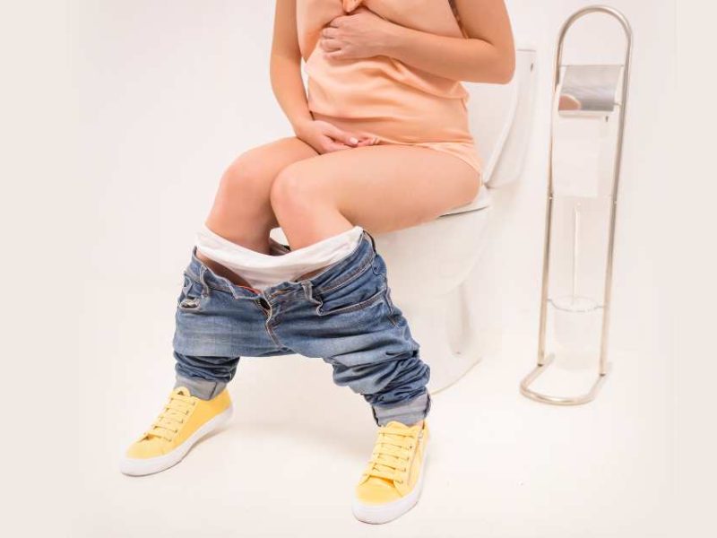 pregnant woman on the toilet