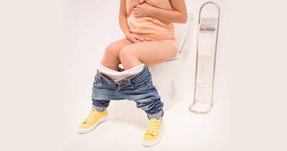 pregnant woman on the toilet