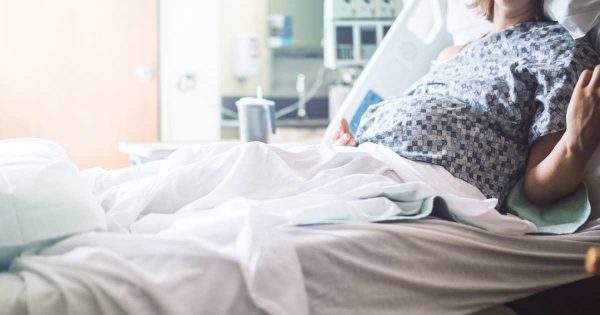 pregnant woman in the hospital bed