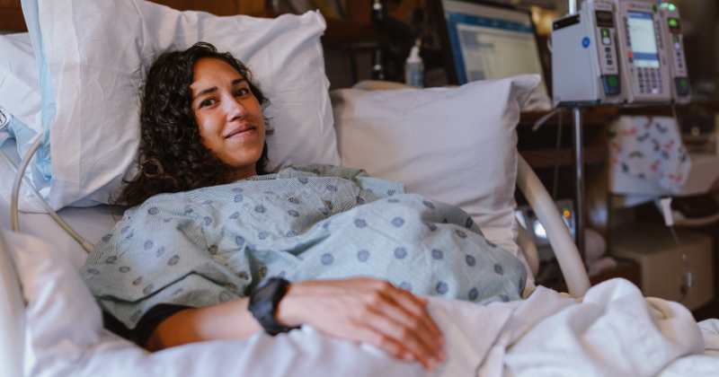 pregnant woman in a hospital bed