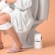 pregnant woman having diarrhea on the toilet