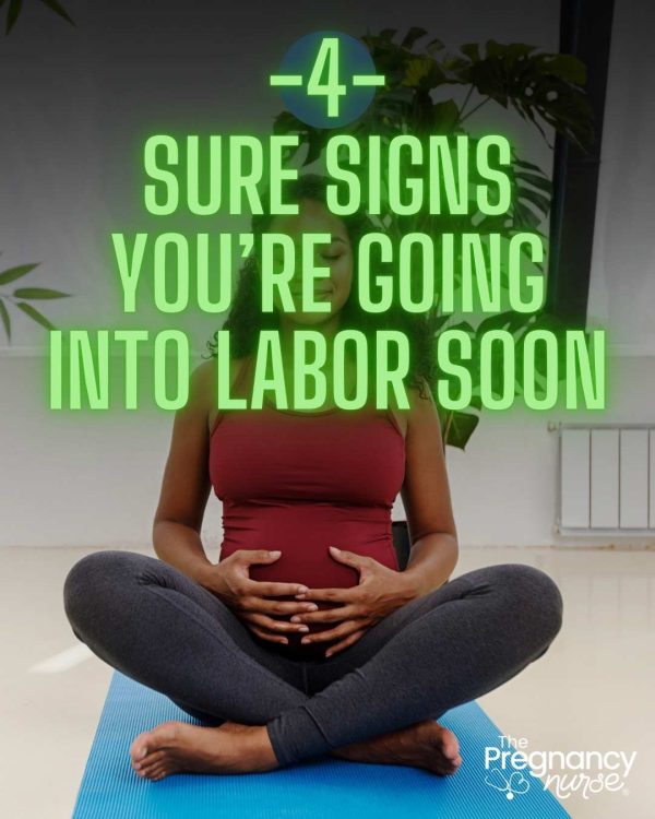 pregnant woman sitting on yoga mat / 4 sure signs you're going into labor soon