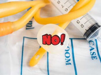 urinary catheter with the word "no" over the balloon.