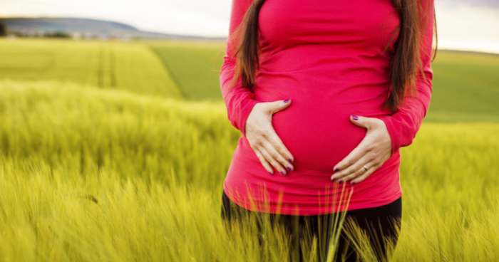 pregnant woman in nature