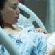 pregnant woman in a hospital bed