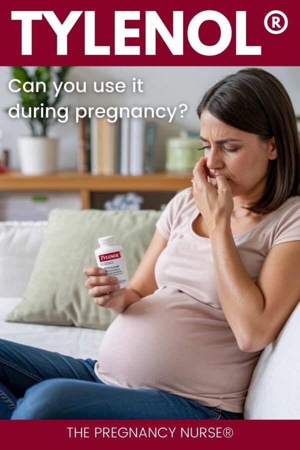 pregnant woman holding a bottle of tylenol