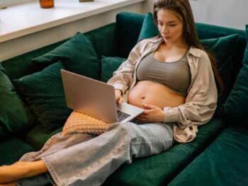 pregnant woman on laptop