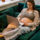 pregnant woman on laptop