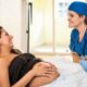 pregnant woman talking to anesthesiologist